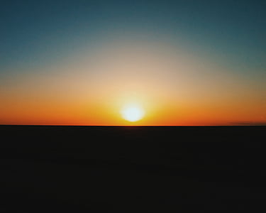 body of water during golden hour thumbnail