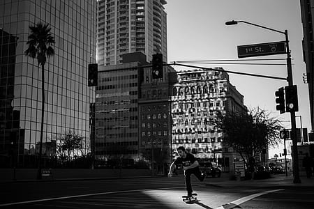 grayscale photography of man riding on skateboard thumbnail