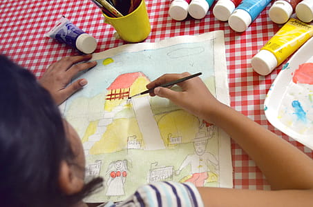 Girl Painting On Canvas thumbnail
