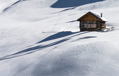 brown wooden house during winter thumbnail