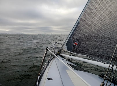 white and grey sailing boat on body of water at daytime thumbnail