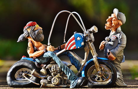 two man with motorcycle scale models thumbnail