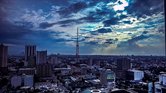 city under blue sky during daytime thumbnail