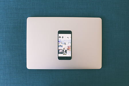 white iPhone 5 with black case thumbnail