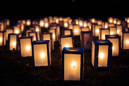 photography of candle inside the lantern thumbnail