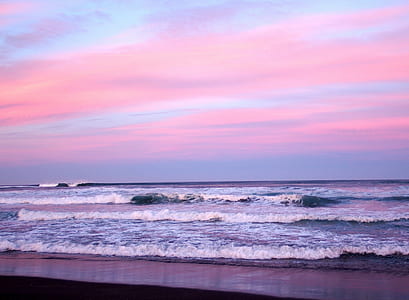 raging body of water on seashore thumbnail