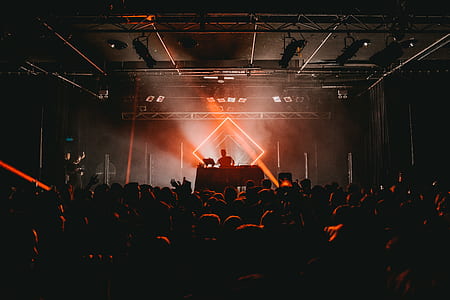 silhouette photo of man on stage thumbnail
