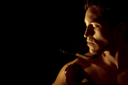 naked man with snake on shoulder thumbnail