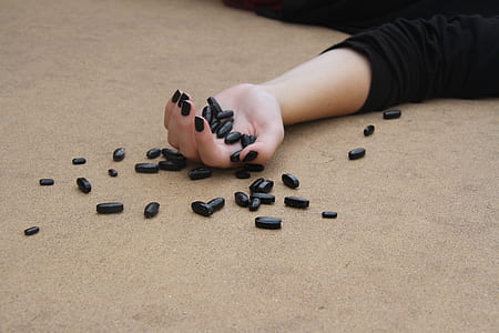 black medicinal tablets thumbnail