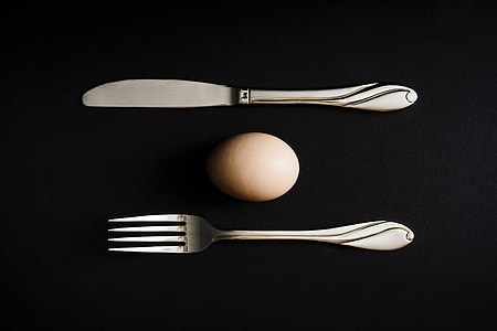 Overhead shot of egg and knife and fork thumbnail