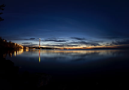 silhouette of lighthouse during sunset thumbnail