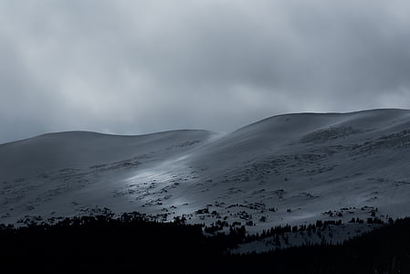 snowy mountain under cloudy sky thumbnail
