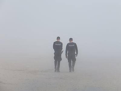 two man wearing police vest and cap thumbnail