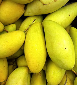closeup photography of green mangoes thumbnail