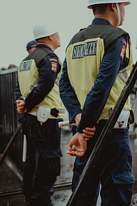 photo of two men wearing security uniform thumbnail