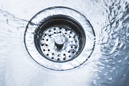 High Angle View Of Water Flowing In Drain thumbnail