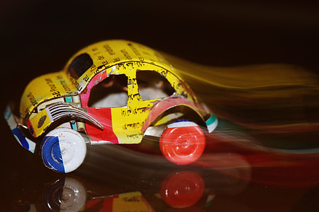 close-up photography of multicolored toy car thumbnail