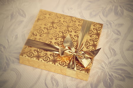 brown box on white textile thumbnail