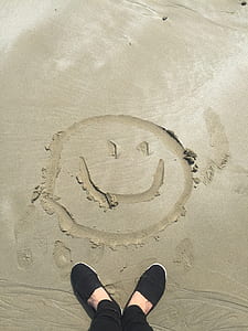 Smiley Drawing on Sand thumbnail