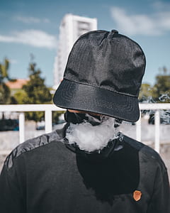 person wearing black cup thumbnail