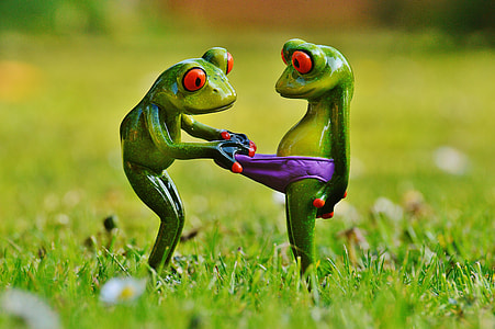 two green frog figurines thumbnail