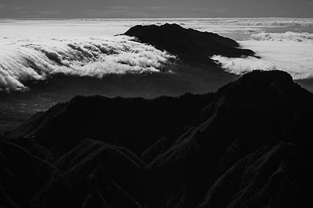 landscape photography of mountains covered by clouds thumbnail