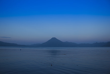 body of water with mountain ahead thumbnail