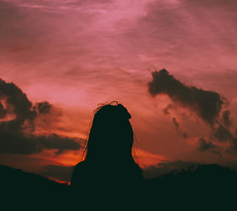 Silhouette of a Woman During Dawn thumbnail