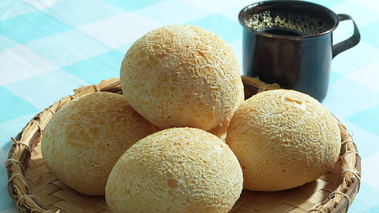 baked bread with cup of coffee on table thumbnail