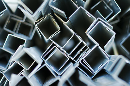 pile of gray metal angle bars thumbnail