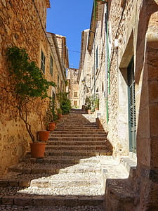 pathway surrounded by houses thumbnail