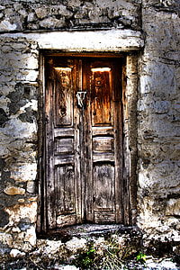 distressed brown wooden French door closed thumbnail