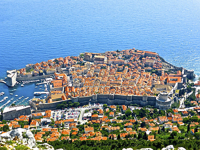 aerial photography of building and beach thumbnail