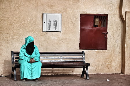 man sitting on bench thumbnail
