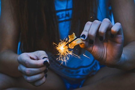 woman holding matchstick thumbnail