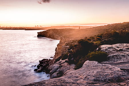 rocks cliffs near ocean thumbnail