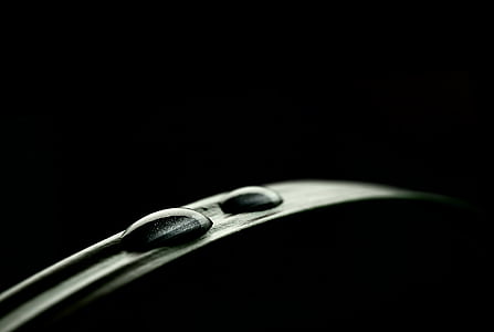 water droplet on leaf inside dark room thumbnail
