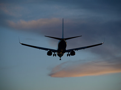 black airline under gray sky thumbnail