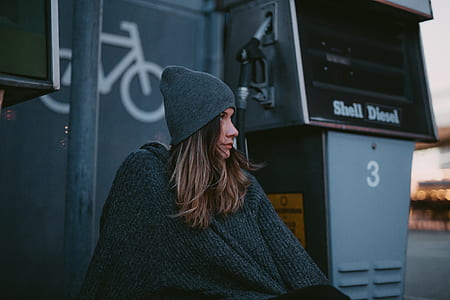 woman sitting on street thumbnail