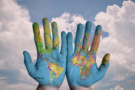 photography of two hands with map painting thumbnail