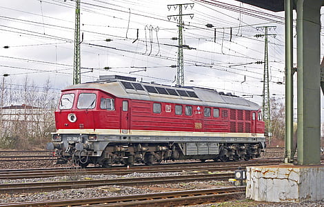 red train at the train station thumbnail