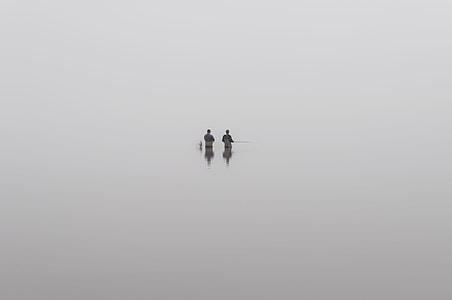 two person on body of water thumbnail