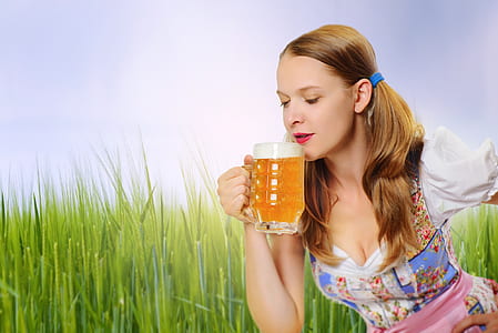 woman holding beer mug thumbnail