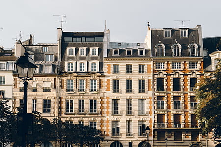 beige and brown painted buildings thumbnail