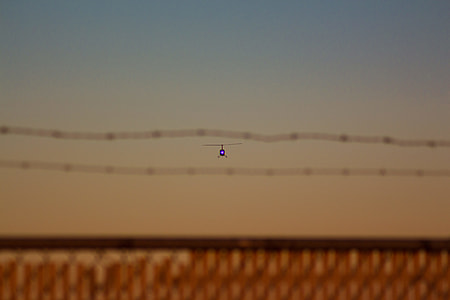 focus photography of helicopter flying thumbnail