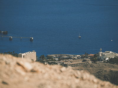 landscape of buildings near the ocean thumbnail