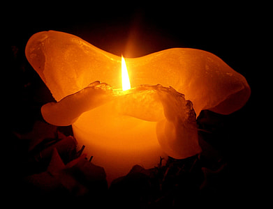 candle with fire turned-on in container thumbnail