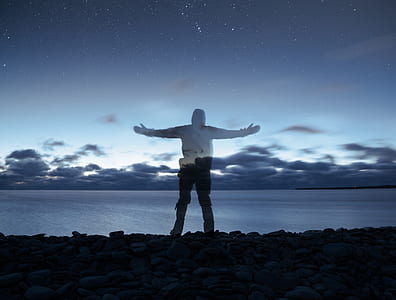 shadow of person raising its two hands thumbnail