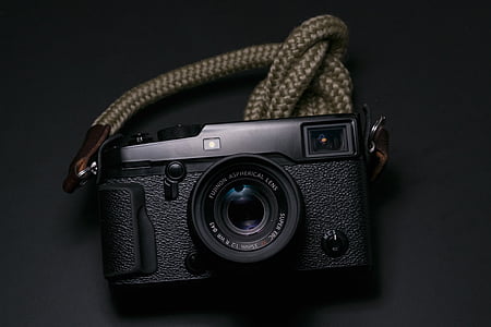 low-light photo of black MIL camera thumbnail