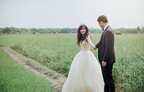 Groom and Bridge Along Hallway at Daytime thumbnail